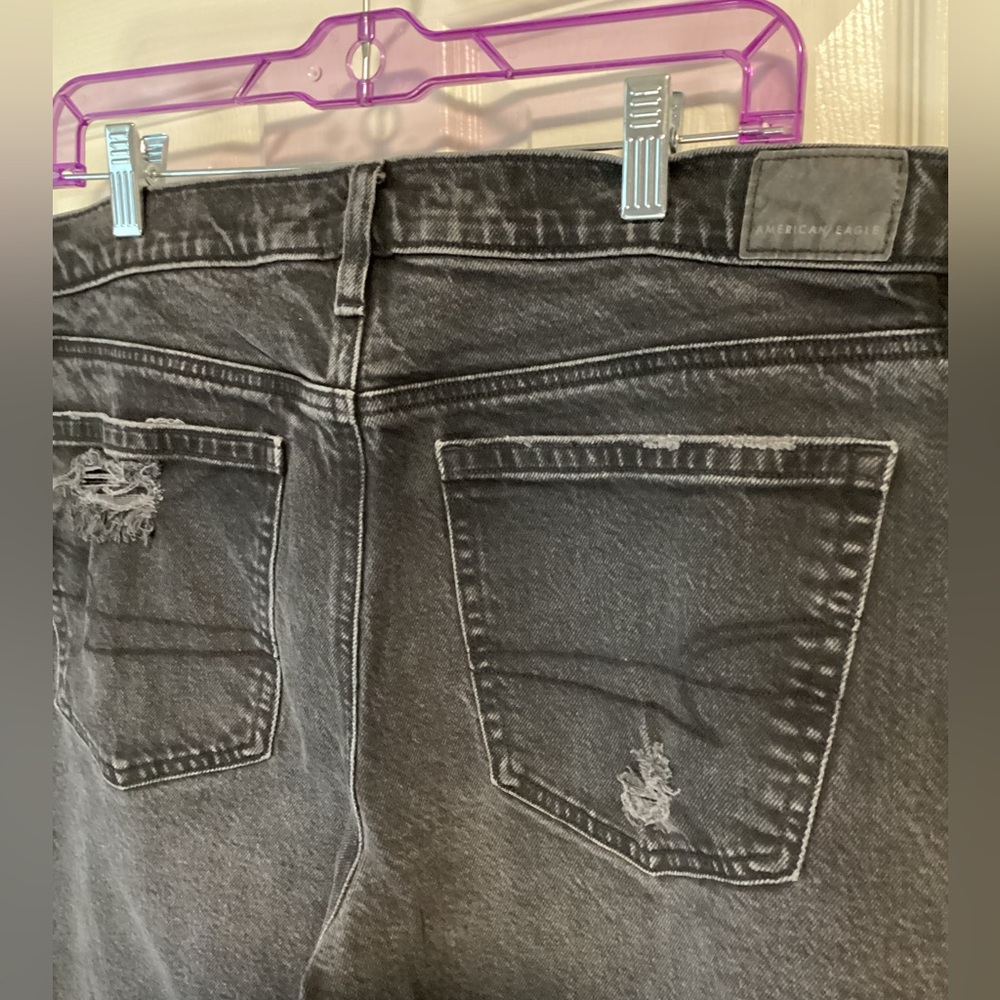 Black stretch American Eagle jeans with a ripped knee-size 14 regular - Picture 4 of 7